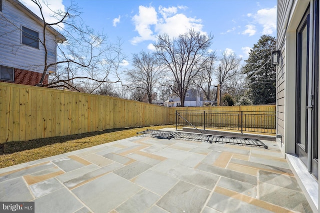 view of patio with a fenced backyard