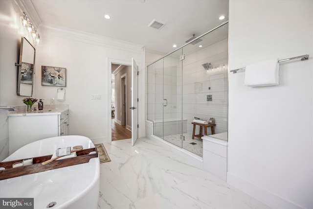 full bathroom with a shower stall, crown molding, baseboards, a freestanding tub, and marble finish floor