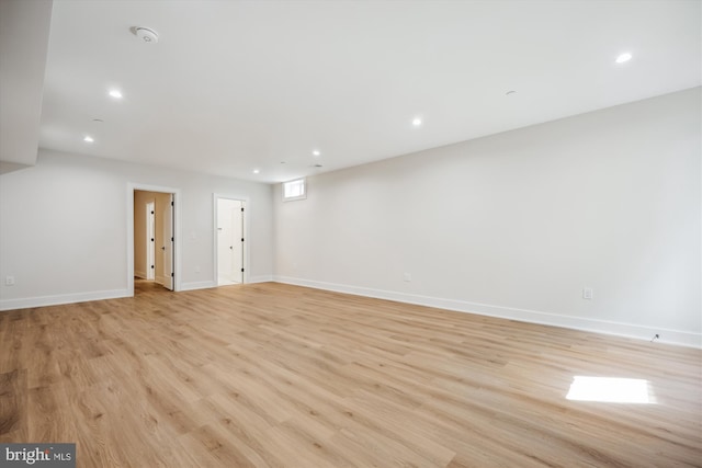 interior space with recessed lighting, baseboards, and light wood finished floors