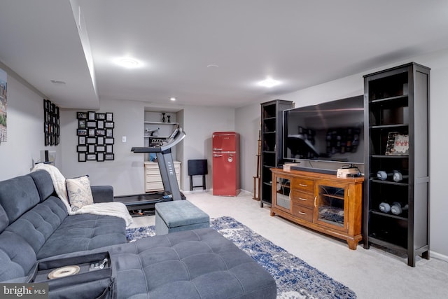 carpeted living room with stairs