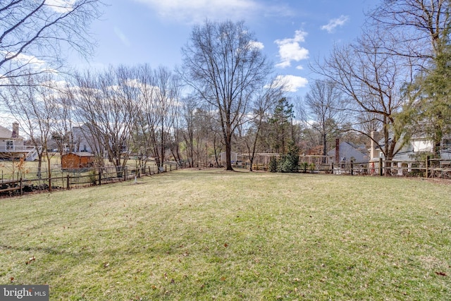 view of yard with fence