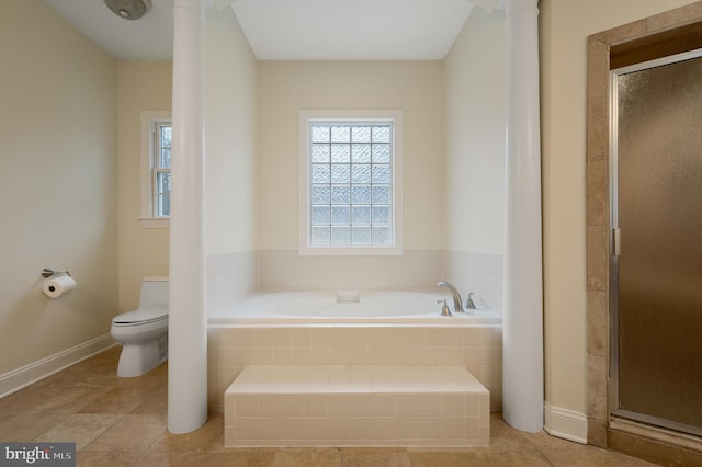 full bath with a garden tub, decorative columns, toilet, a stall shower, and baseboards