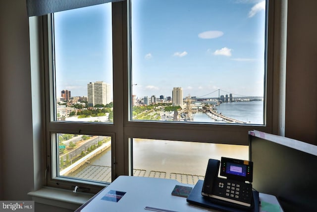 details featuring a view of city and a water view