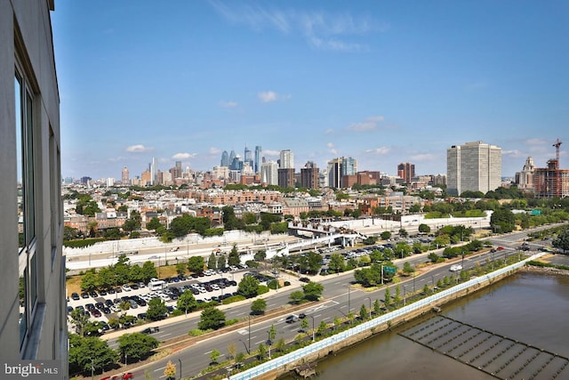 property's view of city with a water view