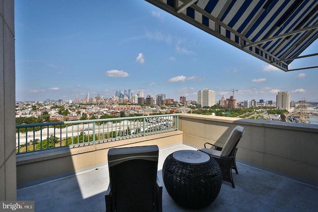 balcony featuring a city view