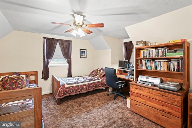 bedroom with lofted ceiling, carpet floors, and ceiling fan