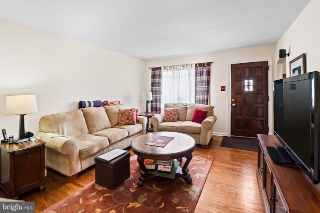 living area featuring wood finished floors