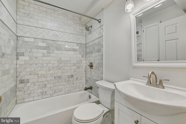 full bath with shower / tub combination, vanity, and toilet