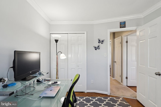 office area featuring dark wood-style floors, crown molding, and baseboards