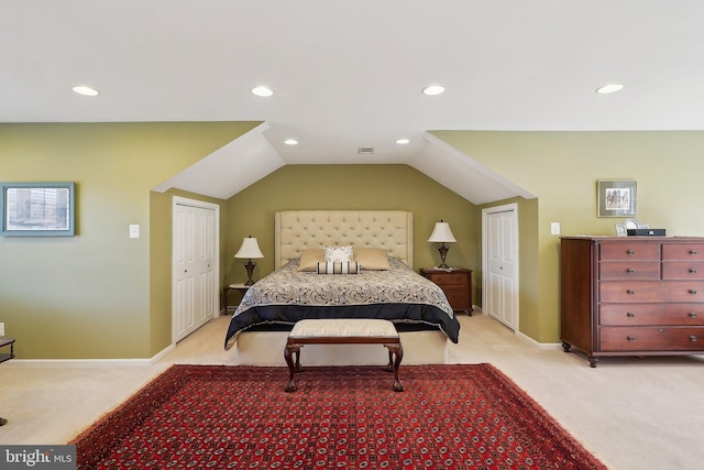 bedroom featuring recessed lighting, light colored carpet, baseboards, and lofted ceiling