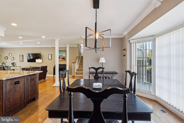 dining space with stairway, visible vents, recessed lighting, ornamental molding, and light wood-type flooring