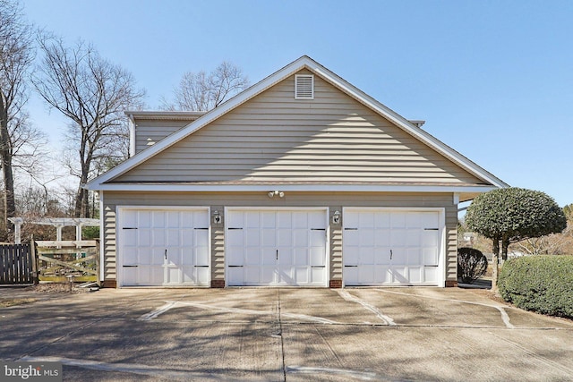 detached garage with fence