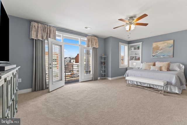 bedroom featuring access to outside, light colored carpet, visible vents, and baseboards