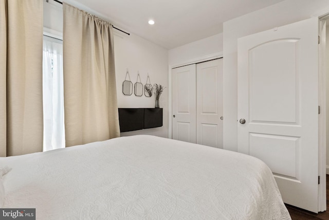 bedroom with a closet and recessed lighting