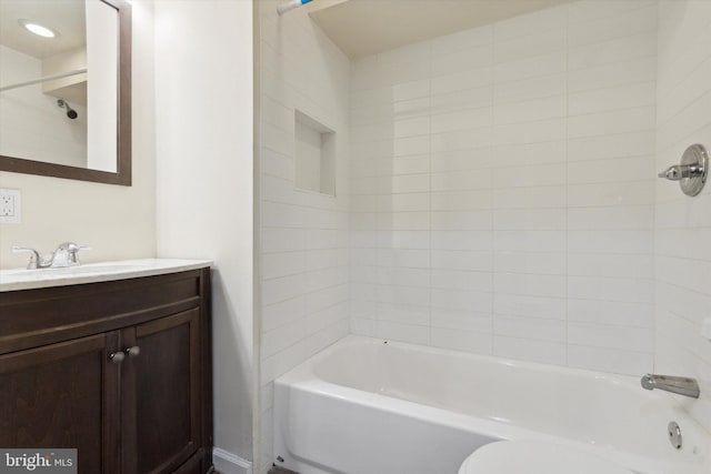 full bath featuring vanity and shower / bathtub combination