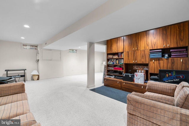 living area featuring carpet, baseboards, and recessed lighting