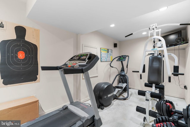 exercise area with recessed lighting and baseboards