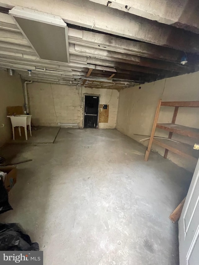 unfinished basement with a sink