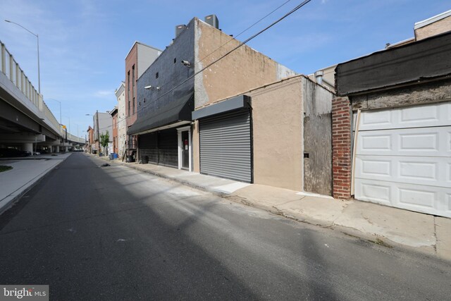 view of road featuring curbs and sidewalks