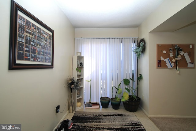 workout room with baseboards