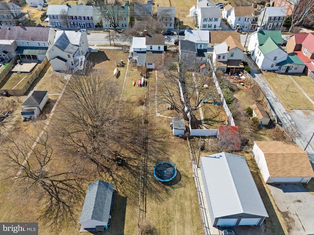 birds eye view of property with a residential view