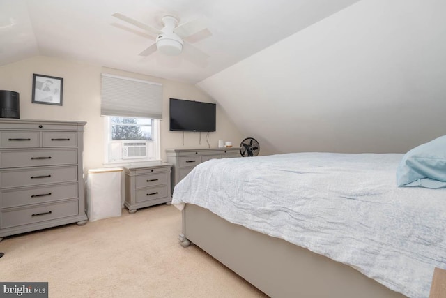 bedroom with a ceiling fan, cooling unit, light carpet, and vaulted ceiling