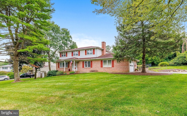 view of front facade featuring a garage, a chimney, a front lawn, and brick siding