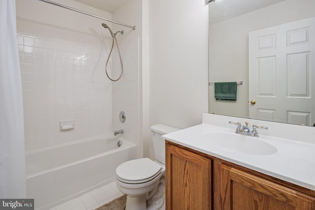 bathroom with tile patterned flooring, vanity, toilet, and shower / bath combo with shower curtain