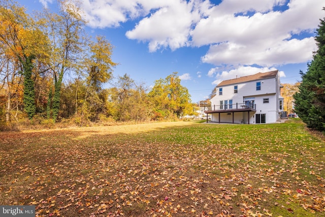 view of yard featuring a deck