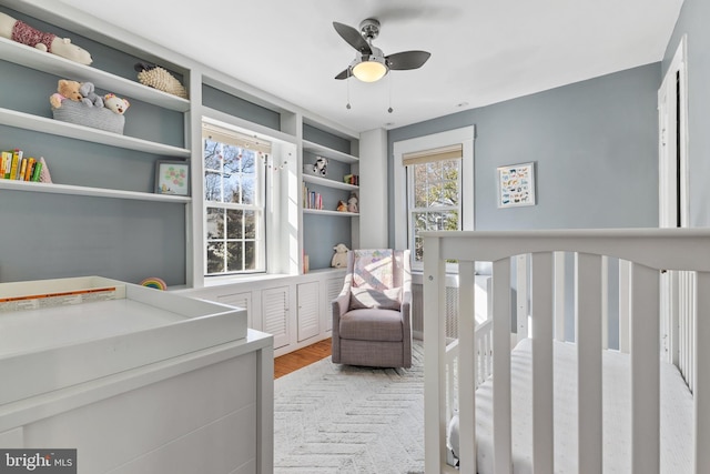 bedroom featuring light wood-style floors