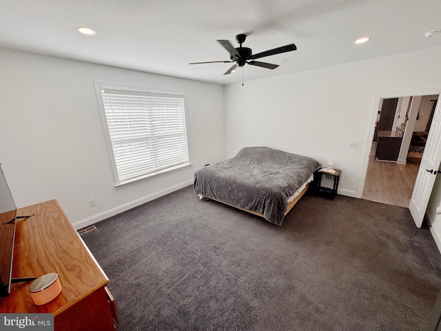 bedroom featuring recessed lighting, a ceiling fan, visible vents, baseboards, and dark colored carpet