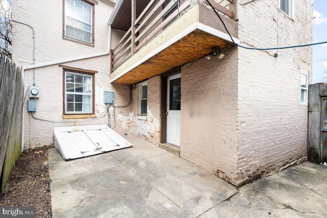 view of patio featuring fence