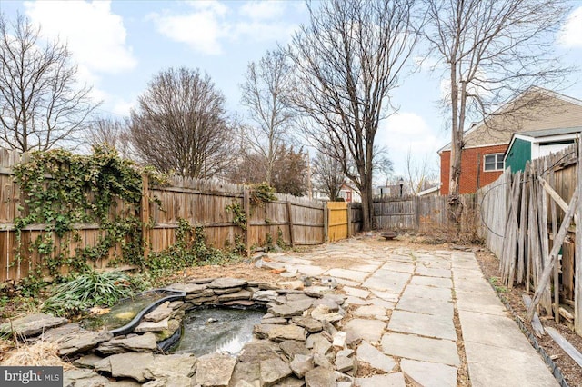 view of patio featuring a fenced backyard