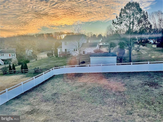 exterior space featuring a fenced backyard