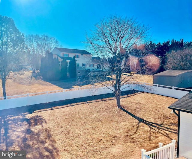 view of yard featuring a fenced backyard