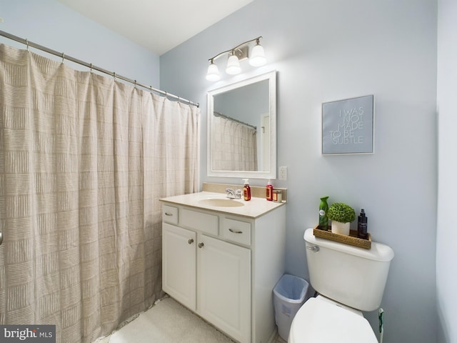 full bath with vanity and toilet