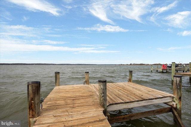 view of dock with a water view