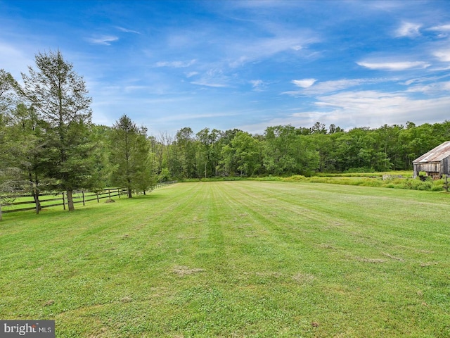 view of yard with fence