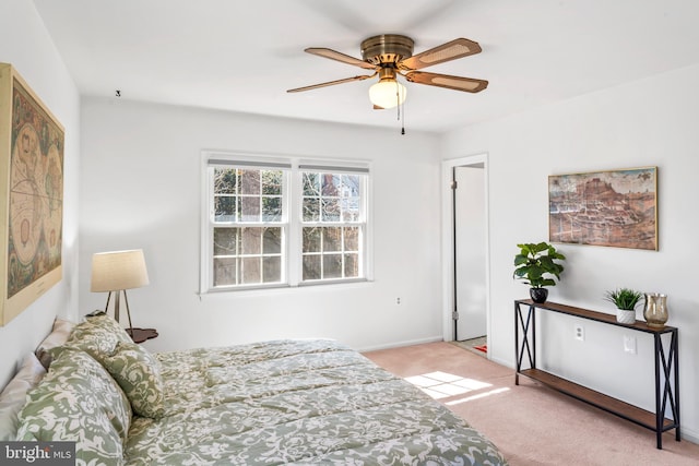 bedroom featuring carpet, ceiling fan, and baseboards