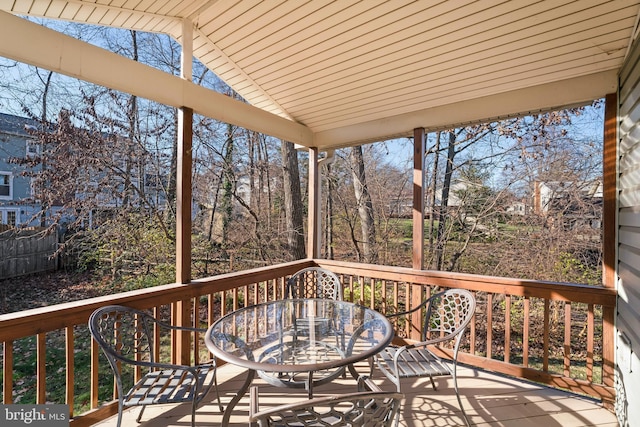 deck with outdoor dining area