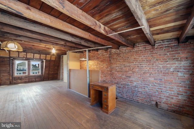 basement with brick wall, wood ceiling, and wood-type flooring