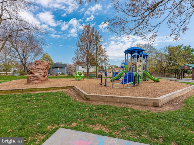 community play area with a yard