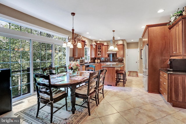 dining room with a toaster, light tile patterned flooring, visible vents, and recessed lighting