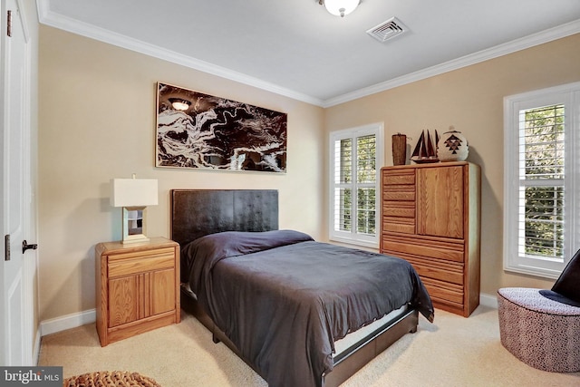 bedroom featuring light carpet, multiple windows, visible vents, and crown molding