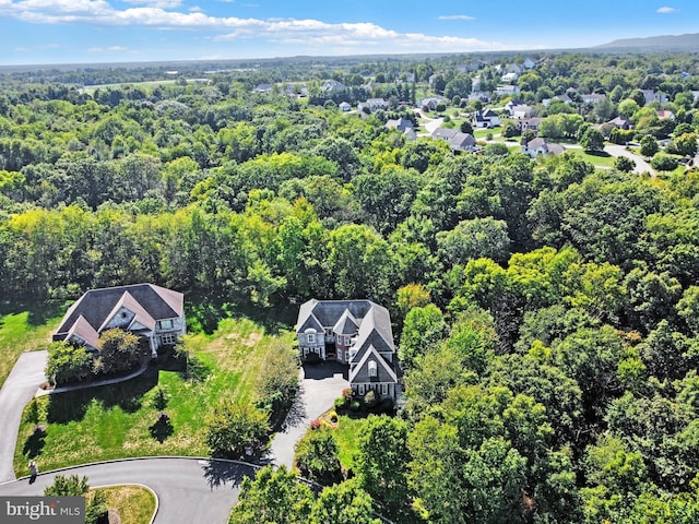 bird's eye view featuring a forest view