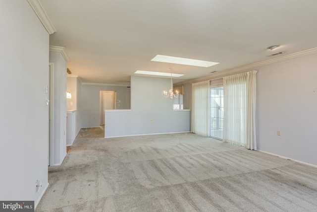 unfurnished living room with light carpet, ornamental molding, a skylight, and an inviting chandelier