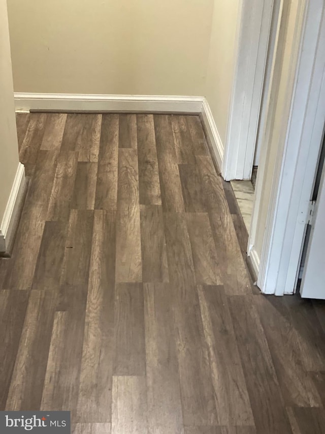 room details featuring wood finished floors and baseboards