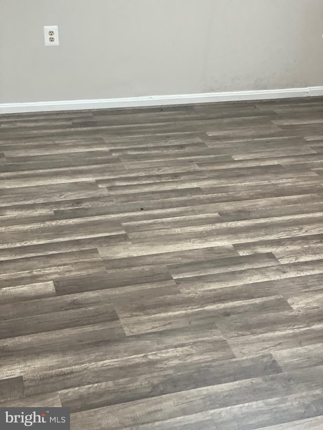 interior details with wood finished floors and baseboards