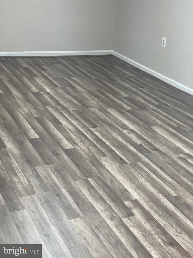 interior details with wood finished floors and baseboards