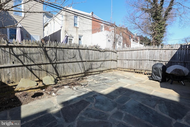 view of patio featuring a fenced backyard